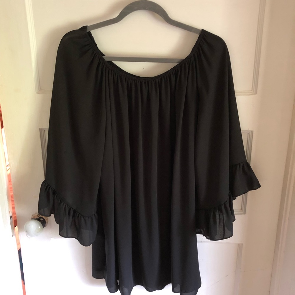 Boutique bought black dress top. Like new.